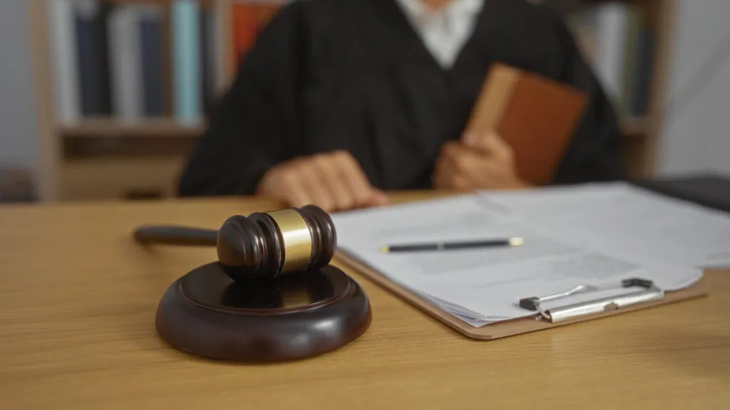 Judge presiding in a courtroom