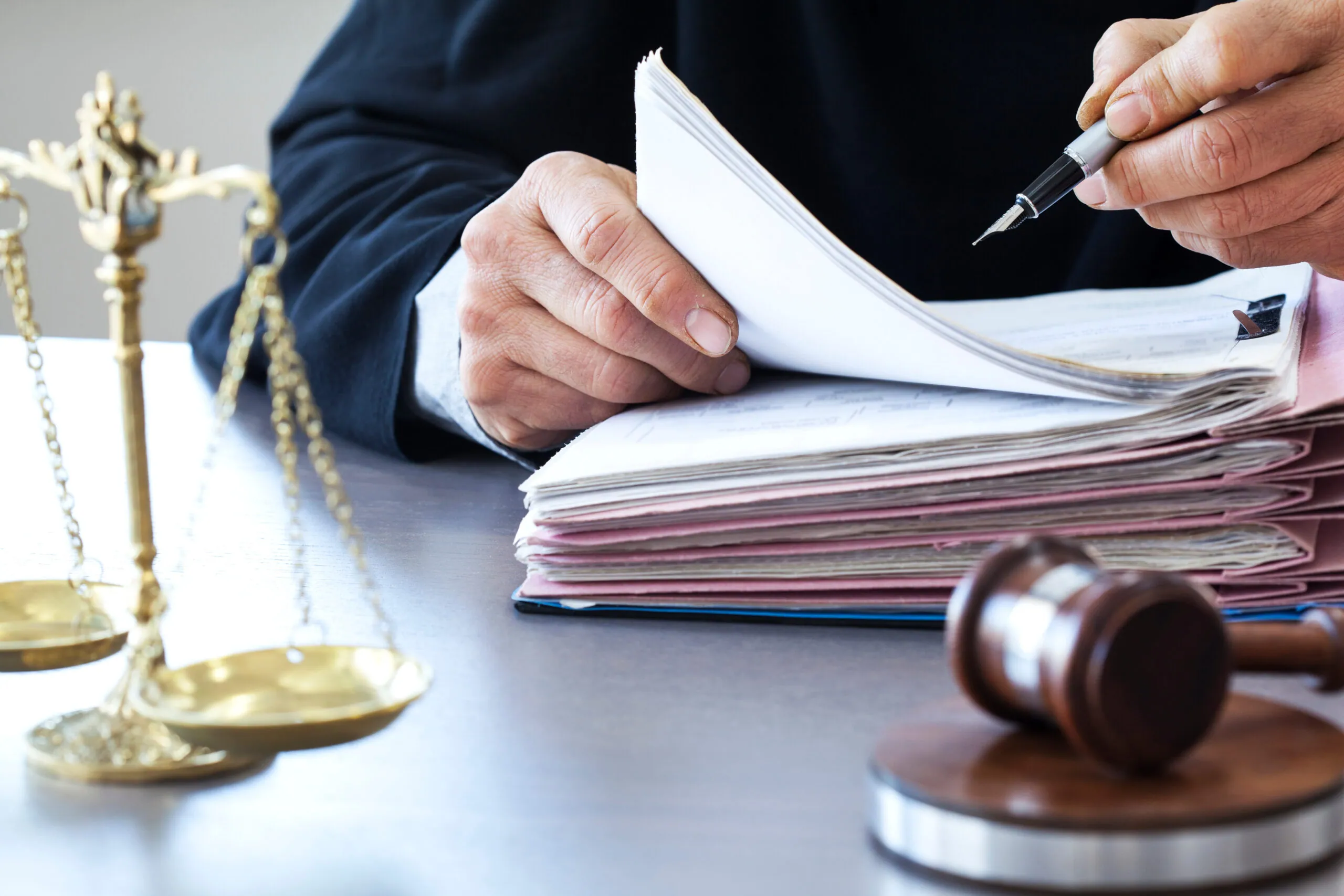 Scales of justice on a lawyer's desk
