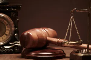 Gavel and scales of justice on a lawyer's desk