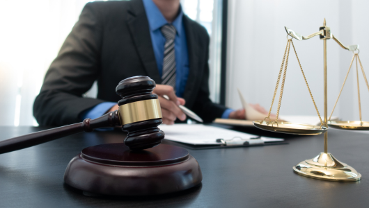 a judge sitting at a desk