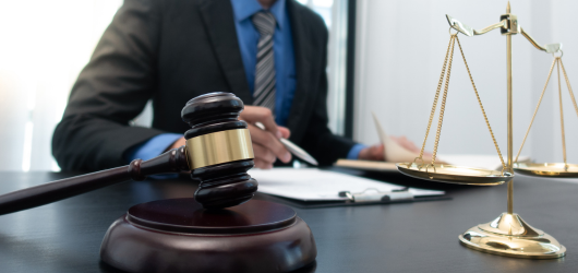 a judge sitting at a desk